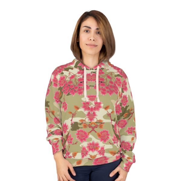 Unleash Your Creativity and Coziness with Our Bohemian Green Camouflage Hoodie with Flower Print Elevate your wardrobe with our Bohemian Green Camouflage Hoodie with Flower Print that offers unparalleled warmth, comfort, and style. Crafted with a blend of polyester and cotton, this hoodie boasts a soft and cozy feel against your skin. The functional design features a large front pocket for convenience and an adjustable hood for added coziness. Our meticulous attention to detail and use of high-quality materials ensure a perfect fit and exceptional durability. With its unique Bohemian Green Camouflage pattern complemented by a pink flower motif, this hoodie is the perfect combination of fashion and functionality. Upgrade your wardrobe with this versatile and stylish hoodie that embodies comfort, creativity, and superior craftsmanship.