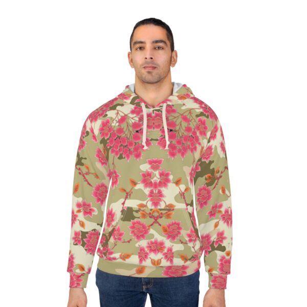 Unleash Your Creativity and Coziness with Our Bohemian Green Camouflage Hoodie with Flower Print Elevate your wardrobe with our Bohemian Green Camouflage Hoodie with Flower Print that offers unparalleled warmth, comfort, and style. Crafted with a blend of polyester and cotton, this hoodie boasts a soft and cozy feel against your skin. The functional design features a large front pocket for convenience and an adjustable hood for added coziness. Our meticulous attention to detail and use of high-quality materials ensure a perfect fit and exceptional durability. With its unique Bohemian Green Camouflage pattern complemented by a pink flower motif, this hoodie is the perfect combination of fashion and functionality. Upgrade your wardrobe with this versatile and stylish hoodie that embodies comfort, creativity, and superior craftsmanship.