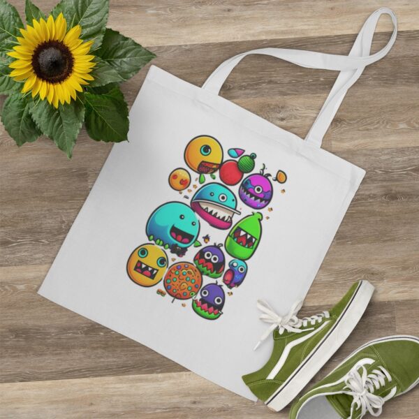 Unleash Your Individuality Looking for a tote bag that's as unique as you are? The Long Handle Full-Color Monster Tote Bag is the answer. Choose from multiple color options and make it your own. Whether you're using it as an everyday essential or a promotional item, this tote bag embodies the essence of you.