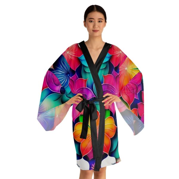 Indulge in Comfort and Beauty Unwind in style with our Flowery Long Sleeve Kimono. Experience the beauty, versatility, and luxurious feel that these robes offer.