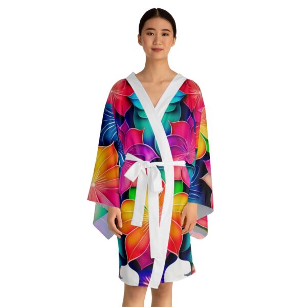 Indulge in Comfort and Beauty Unwind in style with our Flowery Long Sleeve Kimono. Experience the beauty, versatility, and luxurious feel that these robes offer.