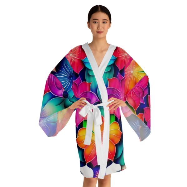 Indulge in Comfort and Beauty Unwind in style with our Flowery Long Sleeve Kimono. Experience the beauty, versatility, and luxurious feel that these robes offer.