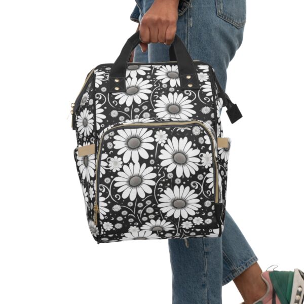 Comfortable and Supportive Designed for your comfort, our Flowers Backpack features adjustable shoulder straps that allow you to find the perfect fit. The padded back panel adds an extra layer of comfort, ensuring you stay comfortable during even the longest of journeys.