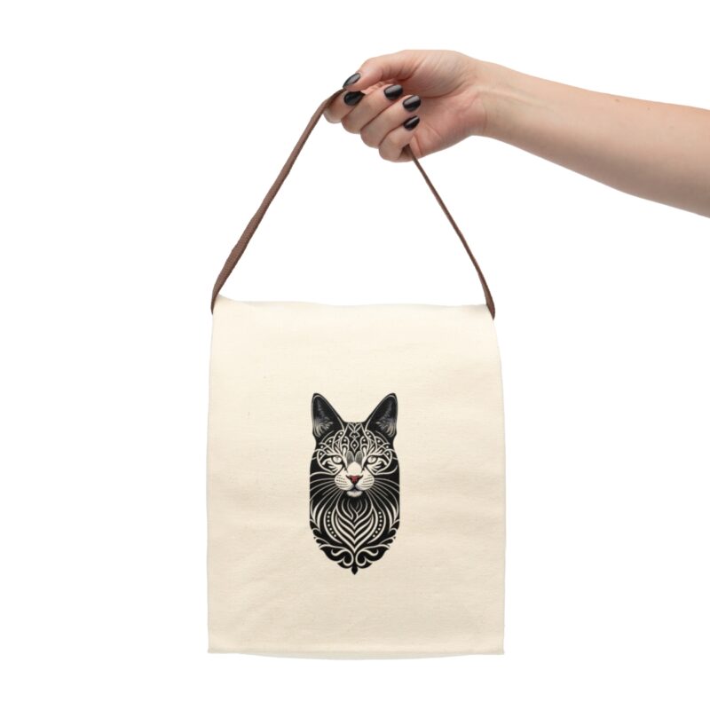 Easy to Carry Anywhere The Tribal Cat Lunch Bag comes with a convenient strap handle, making it easy to carry around wherever you go. Whether it's your daily commute, a field trip, or a picnic in the park, our lunch bag is your perfect companion.