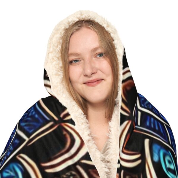 Step into a world shrouded in enigmatic warmth with the captivating Hooded Shaman Blanket. Embrace the mystique of your surroundings without ever leaving the sanctuary of your bed. Crafted for those who seek the extraordinary, this remarkable hooded blanket is your key to unlocking a realm of comfort and intrigue.