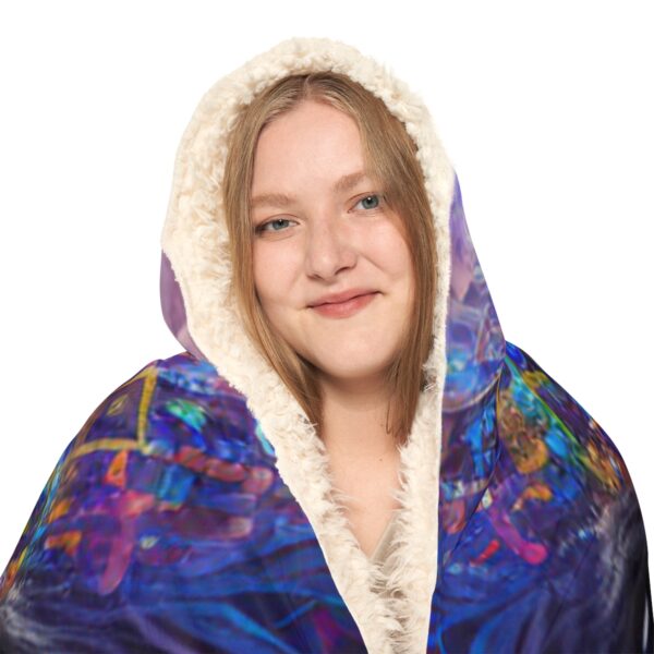 Embrace the unknown, envelop yourself in the mysterious allure of Hooded Shaman Blanket.