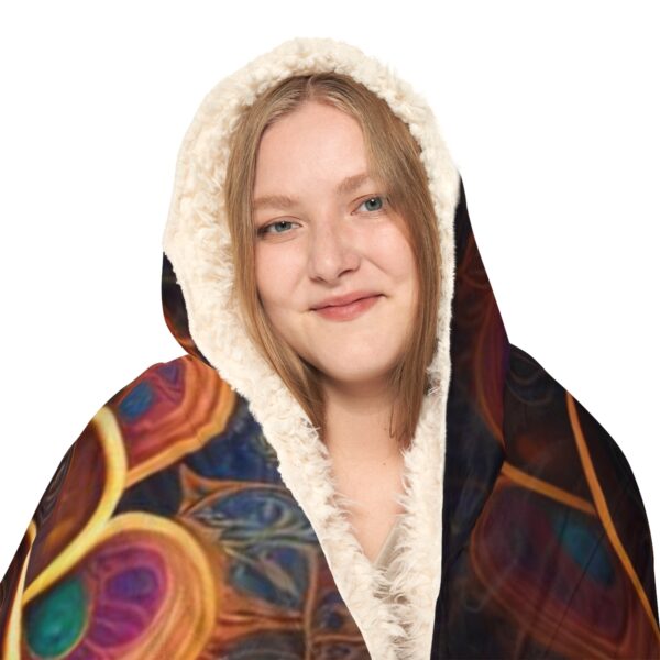 Step into a world shrouded in enigmatic warmth with the captivating Hooded Shaman Blanket. Embrace the mystique of your surroundings without ever leaving the sanctuary of your bed. Crafted for those who seek the extraordinary, this remarkable hooded blanket is your key to unlocking a realm of comfort and intrigue.