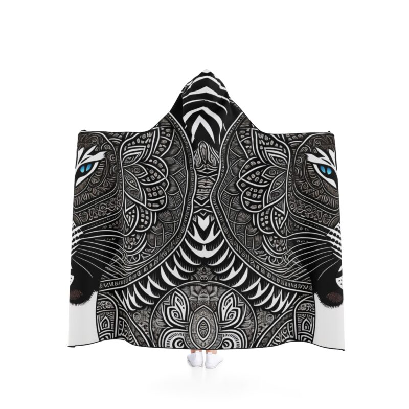 The vibrant Tibal Jaguar pattern adds a touch of excitement to your everyday routine, making it a unique and eye-catching fashion statement. Be the life of the party or campfire with this Hooded Shaman Blanket that will keep you warm and stylish all year round.